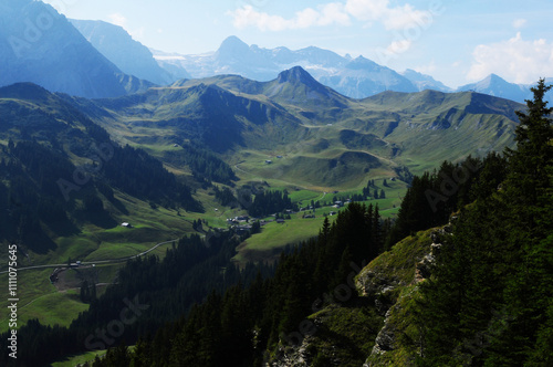 Swiss alps: mountain landscape, lush green hills in Adelboden/Silleren, Bernese Oberland photo