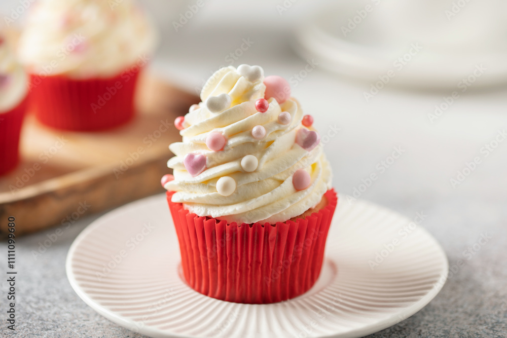 Red velvet cupcakes with whipped cream for Holidays Red velvet cupcakes with whipped cream for Holidays