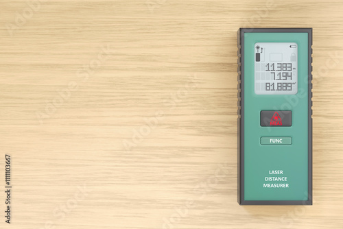 Top view of laser distance meter on a wooden desk