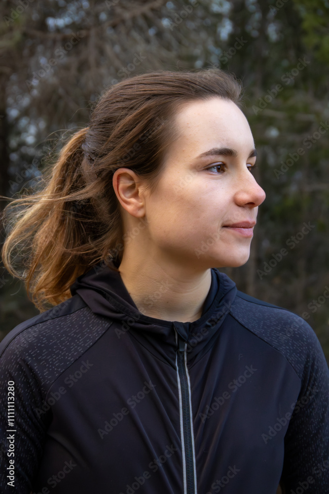Beautiful Caucasian white girl before running at forest trial. Healthy lifestyle warming up outdoors Beautiful Caucasian white girl before running at forest trial. Healthy lifestyle warming up outdoors