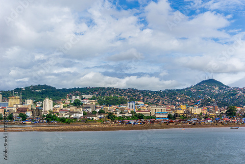 Hillside Skyline of Freetown with Colorful Architecture and Blue Waters, Panoramic View of Freetown with Lush Green Hills and Vibrant Skyline