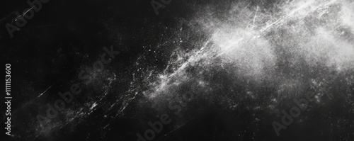 A design of dust and scratches on a distressed photo editor layer. A black abstract background. A copy space.