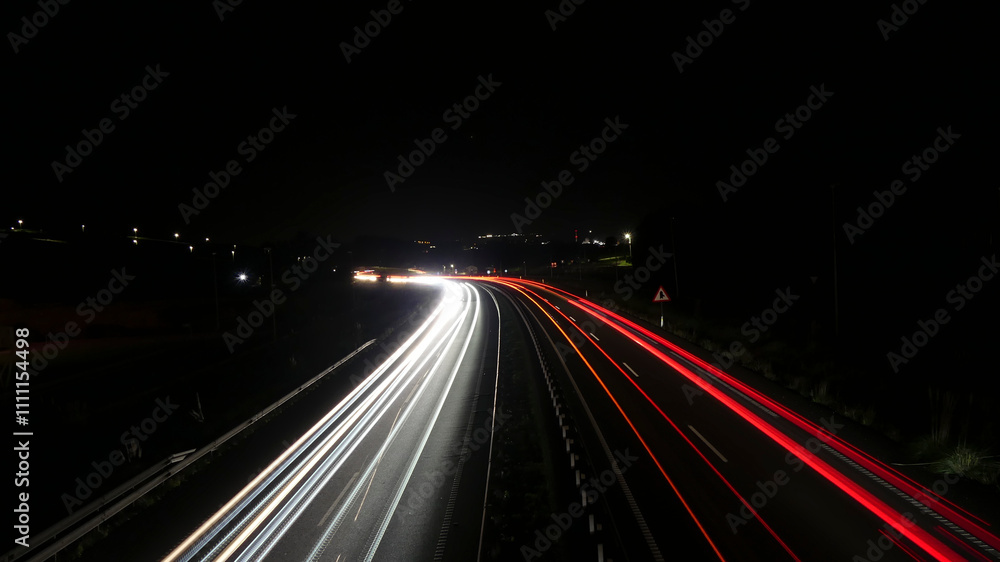 Car lights on a Spanish motorway. Car lights on a Spanish motorway.