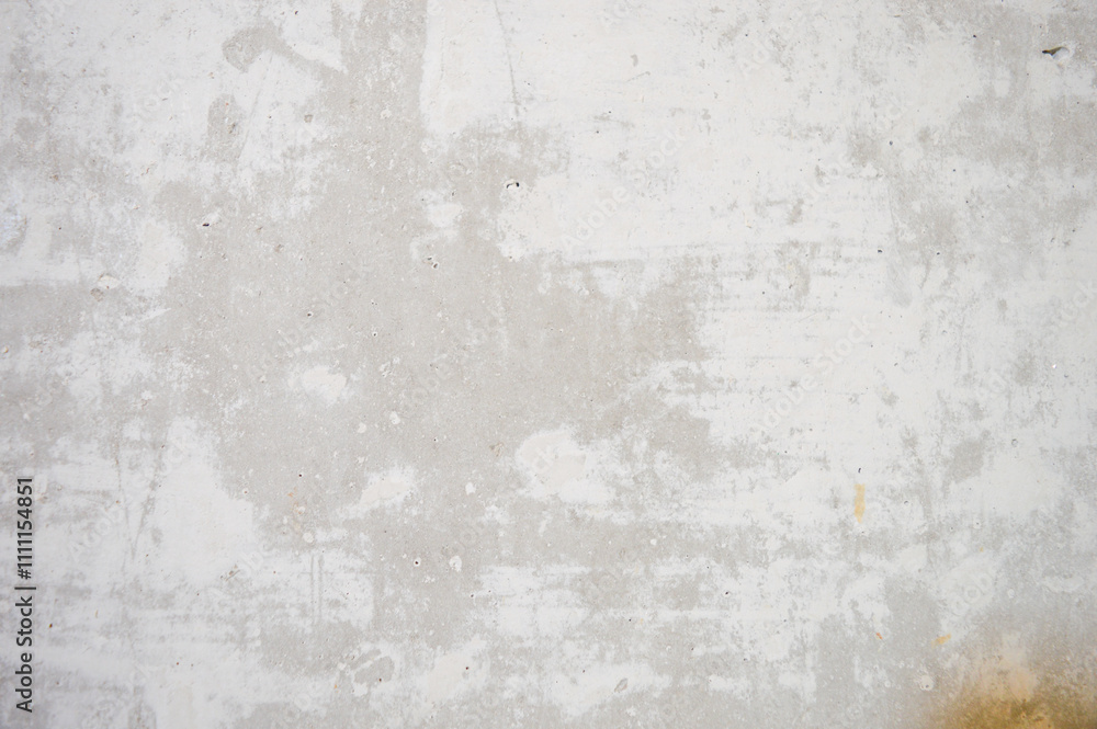 Fototapeta premium close-up rough aged wall with patches of peeling paint and faded markings background designs before and after transformations in renovation artworks urban decay restoration painting improvement tips