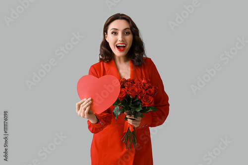 Happy young woman with bouq...