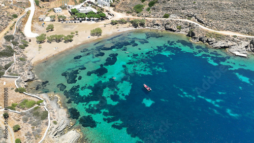 Aerial drone photo of small beach of Fasolou next to famous and picturesque seaside fishing village of Faros, Sifnos island, Cyclades, Greece photo