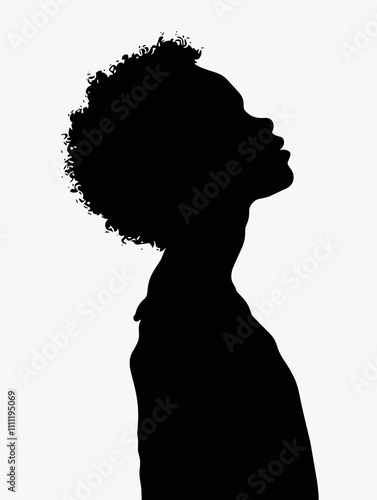 Black and white portrait of a young woman with a short afro. The woman is looking up, and the image is in black and white