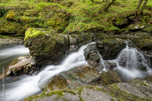 Long exposure of a waterfall on the East Lyn river at Watersmeet in Exmoor National Park