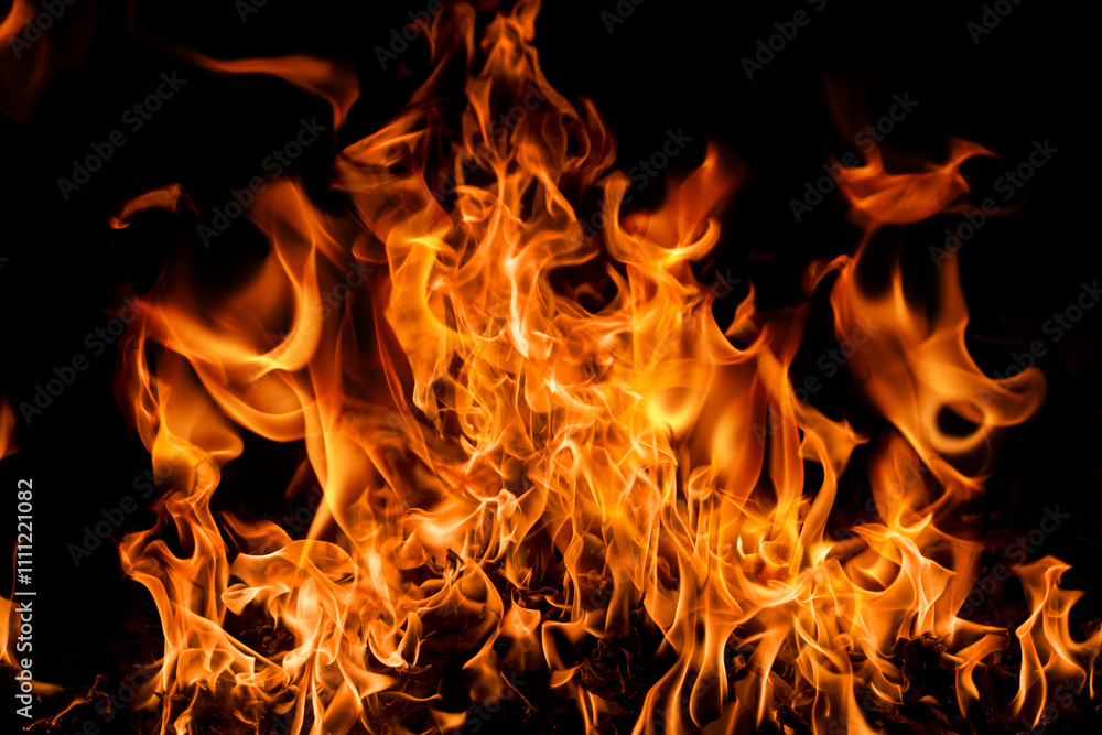 Texture of fire on black background. Abstract fire flame background. Large burning fire. Blaze fire flame texture background. Texture of fire on black background. Abstract fire flame background. Large burning fire. Blaze fire flame texture background.