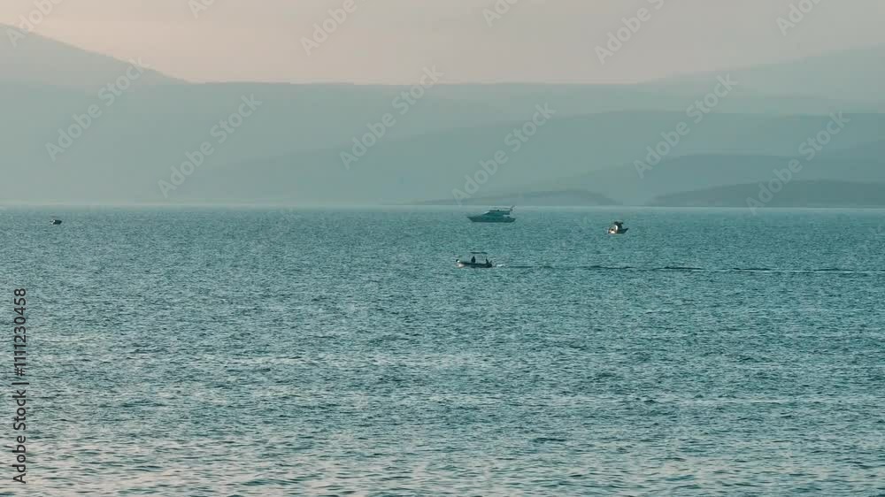 DenizdeGidenTekneBoat on the sea - drone tracking and high quality image of the boat on the Aegean Sea in Izmir DenizdeGidenTekneBoat on the sea - drone tracking and high quality image of the boat on the Aegean Sea in Izmir