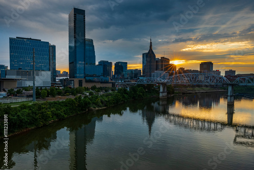 sunset to night view of Nashville Skyline as seen over the Cumberland River