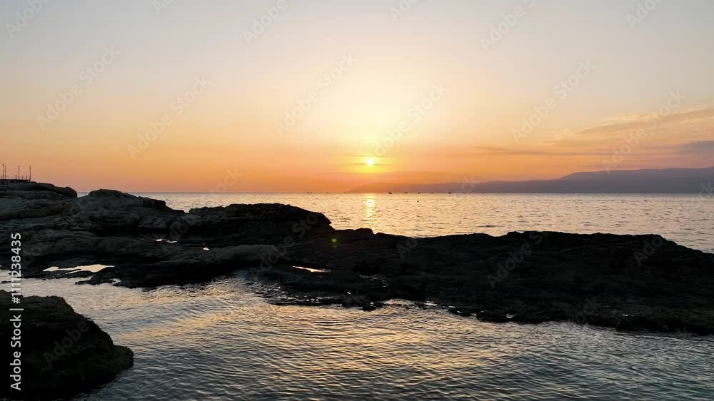 Sunset and seascape - high quality image of the sunset over the sea captured by drone. Sunset and seascape - high quality image of the sunset over the sea captured by drone.