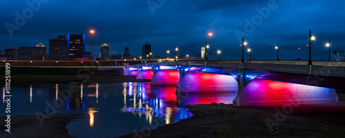 Quadro su tela illuminated Red White and Blue 5th Street Bridge crosses Miami River at night in