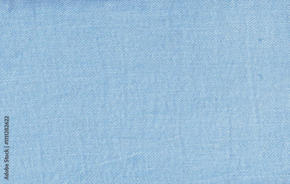 Blue jeans denim fabric texture background. Diagonal weaving jean cloth, Canvas Closeup, macro. Textile for decor, upholstery, garment. Wallpaper, backdrop.