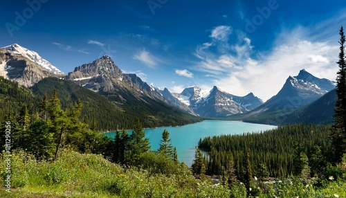 scenic view of mountain range and whitefish lake photo