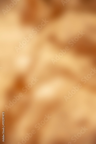 Beige, orange coloured soft blurred abstract background