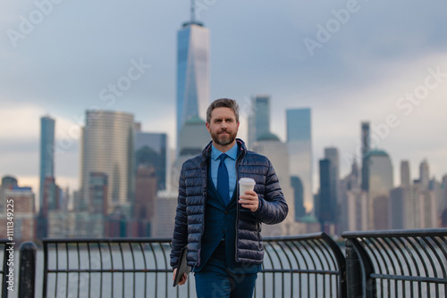 Business man freelancer, entrepreneur, director, boss, manager, realtor, insurance agent, broker, employer, lawyer, office worker walk outside on street in New York. Mature businessman outdoor.