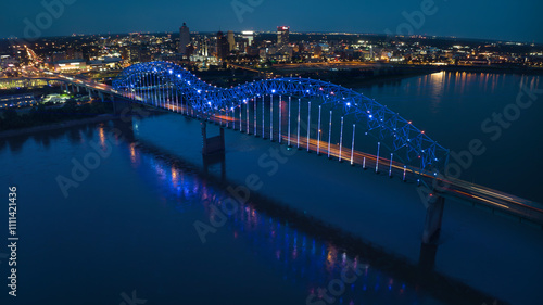 JULY 6, 2023 - MEMPHIS, TN, USA - Hernando De Soto Bridge LIGHT SHOW - Memphis, Tennessee over Mississippi River at night