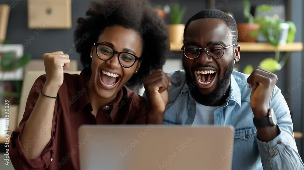 Two friends express their excitement and happiness together in a shared workspace. Their joyful reactions highlight a moment of shared success and friendship, creating a warm atmosphere. Two friends express their excitement and happiness together in a shared workspace. Their joyful reactions highlight a moment of shared success and friendship, creating a warm atmosphere.