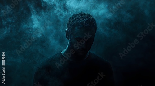 A Man Stands in Teal Smoke Enveloped in Mystery photo