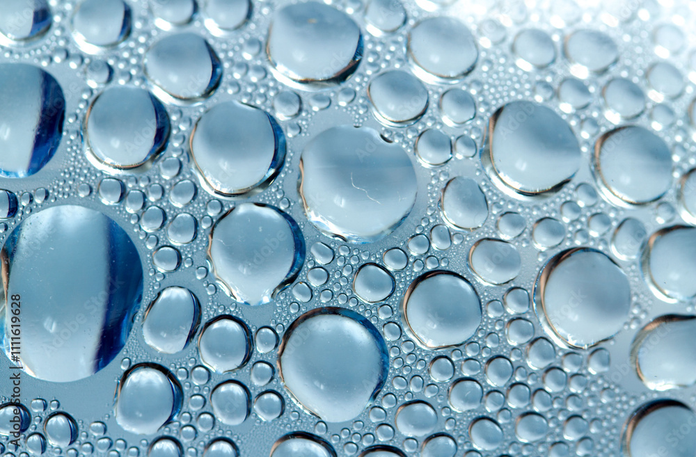 The image is of a sheet of water droplets The image is of a sheet of water droplets