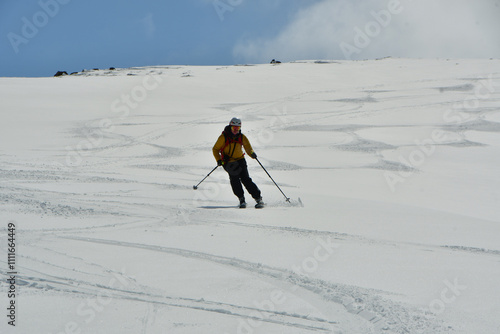 Skiing on puyehue vulcano fast freeride professional photo