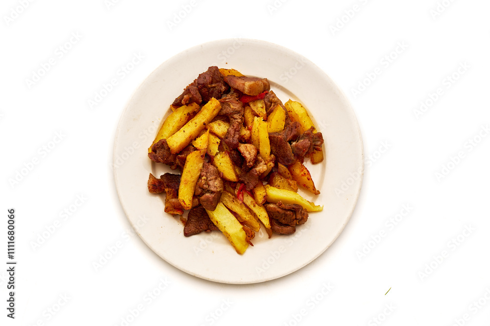A plate of food with meat and potatoes on a white background A plate of food with meat and potatoes on a white background