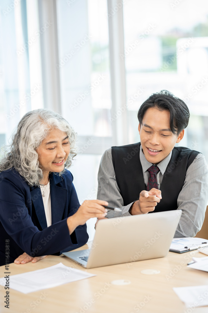 Executives are having a meeting with employees to discuss business planning in a conference room. Executives are having a meeting with employees to discuss business planning in a conference room.