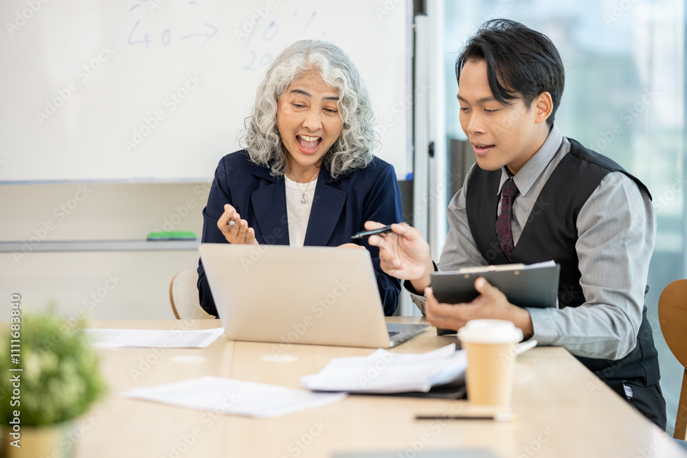 Executives are having a meeting with employees to discuss business planning in a conference room. Executives are having a meeting with employees to discuss business planning in a conference room.