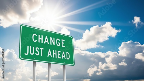 Green road sign indicating upcoming change under a bright blue sky.