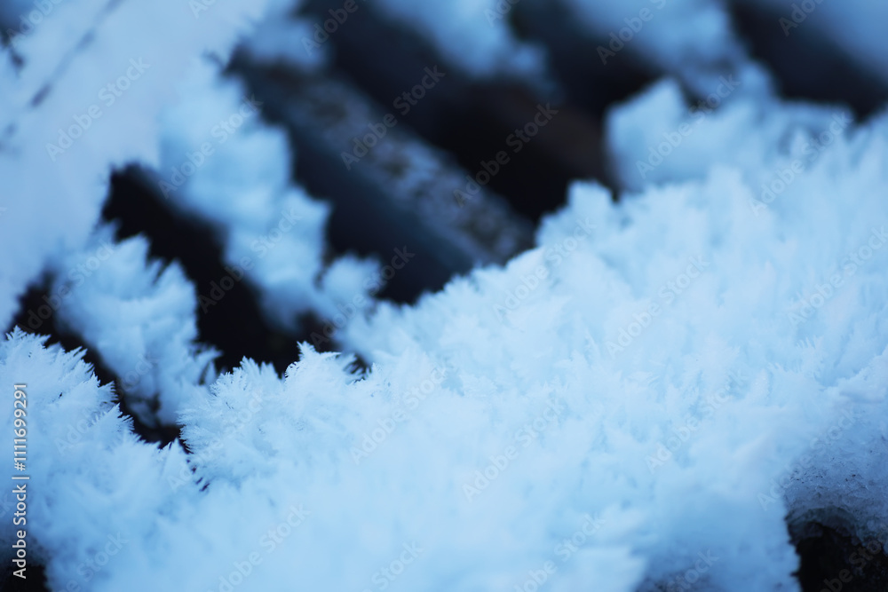 Φωτογραφία Close-Up of Frost-Covered Metal Grate on a Cold Winter Day