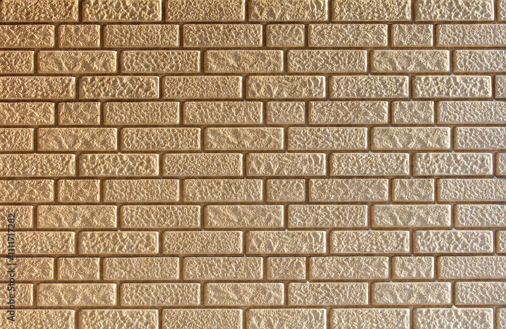 Obraz premium A brick wall with a rough texture