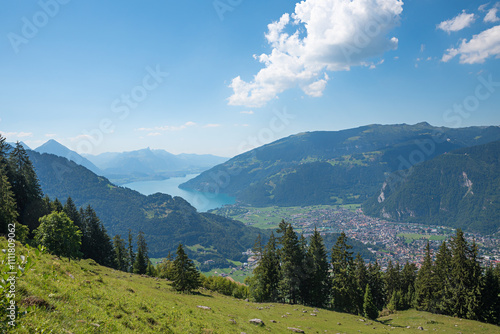 view from hiking trail Breitlauenen to Niederhorn mountain and lake Thunersee, switzerland photo