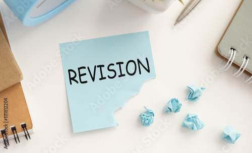 Word writing text Revision. Business concept for action of revising over someone on the table