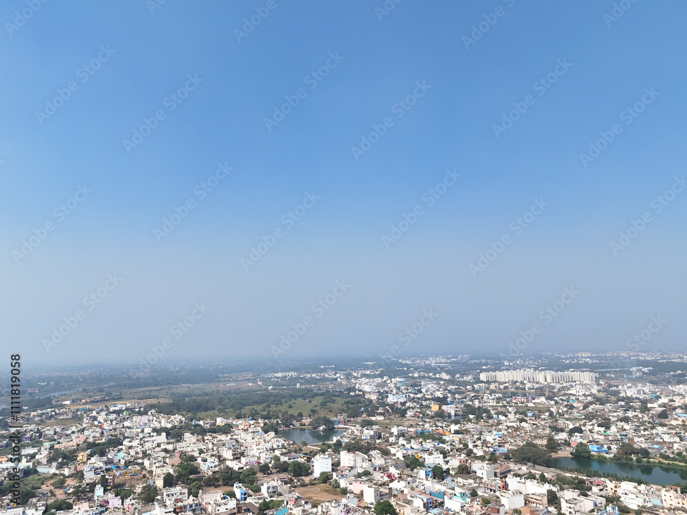 Urban landscape aerial view, Cityscape with river backdrop, Residential area and greenery, Top view of city development, Suburban buildings and open spaces, Modern housing near nature. Urban landscape aerial view, Cityscape with river backdrop, Residential area and greenery, Top view of city development, Suburban buildings and open spaces, Modern housing near nature.