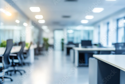 Defocused modern business office background  featuring blurred desks and glass partitions  creating a sleek and professional atmosphere