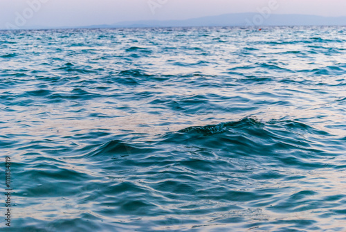 Surface texture of the Aegean sea. Small sea waves