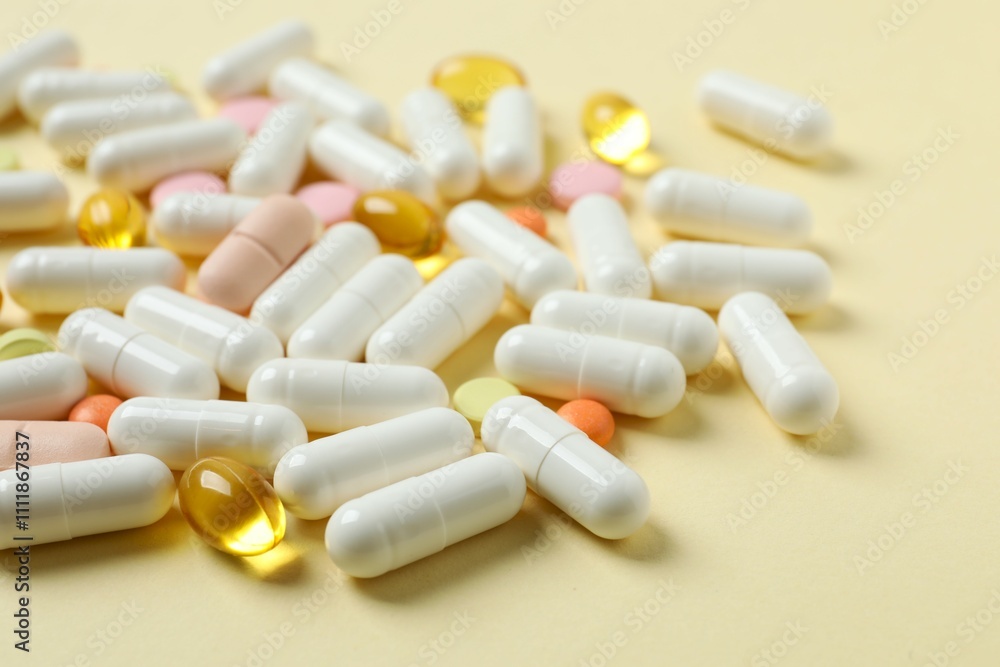 Various pills and capsules on a color background Various pills and capsules on a color background