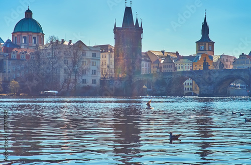 Photography The sunny Vltava against the Old Town domes and towers, Prague, Czechia