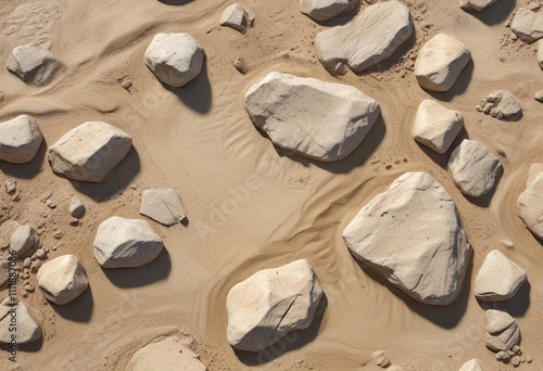 Rough stone texture with gradual transition to smooth sand, earthy tone, roughness, grainy photo