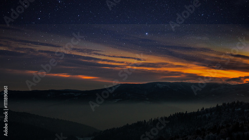 Mountain with orange sunset background for desktop home screen, shadow of a mountain range stretches across a landscape, HD space wallpaper