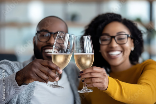 Celebrating joyful moment, couple toasts with champagne glasses, smiling happily together. Their connection radiates warmth and happiness in cozy setting