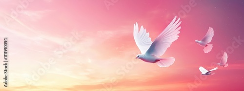 A flock of white birds flying in the sky