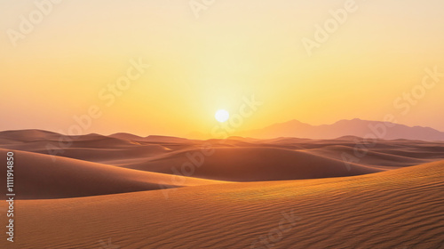 Horizon line at sunrise reveals soft peach hues over the desert landscape