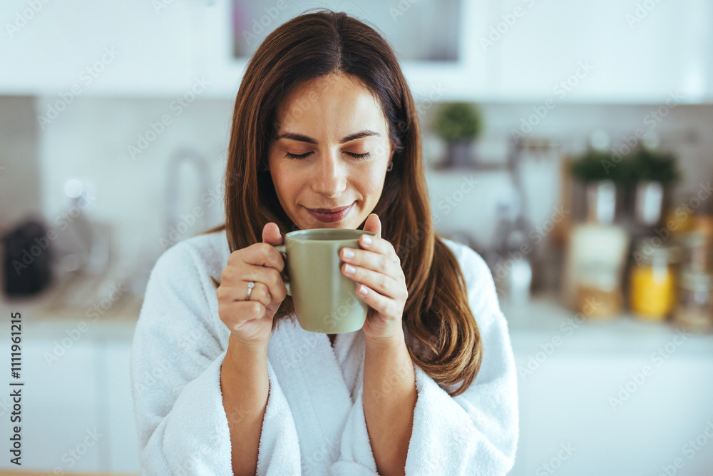 Woman Enjoying Morning Coffee in Cozy Kitchen Setting Woman Enjoying Morning Coffee in Cozy Kitchen Setting