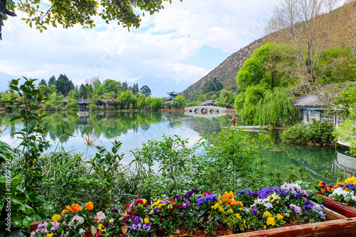 Chinese Traditional Pagoda, Pavilion and Arch Bridge at the Black Dragon Pool Park, Lijiang Old Town  photo