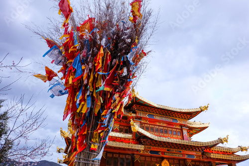 Dafo Temple and its golden World's Largest Prayer Wheel in Guishan park, Shangri-La, China  photo