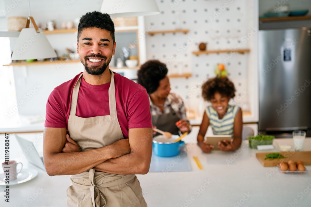 Happy smiling african american parents enjoy weekend play with child in kitchen. Family love concept Happy smiling african american parents enjoy weekend play with child in kitchen. Family love concept