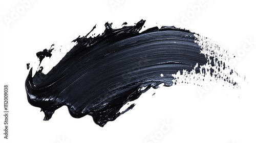 A dynamic black paint stroke showcasing rich texture and movement against a white background. photo