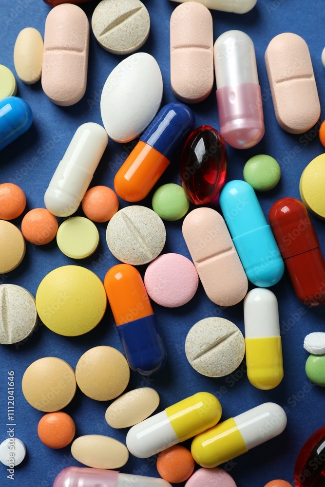 Various pills and capsules on a color background Various pills and capsules on a color background